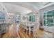 Well-lit dining room featuring a large window and view into the hallway and entry at 463 Lake Wylie Rd, Belmont, NC 28012