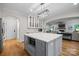 Well-appointed kitchen with a large island, modern appliances, and open access to living spaces at 463 Lake Wylie Rd, Belmont, NC 28012