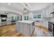 Stylish kitchen island and eat in counter, with modern appliances and wood flooring at 463 Lake Wylie Rd, Belmont, NC 28012