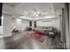 Basement living room with a couch, dining table, and a cozy tent area at 463 Lake Wylie Rd, Belmont, NC 28012
