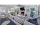 Cozy living room featuring a fireplace, large windows, and comfortable seating at 463 Lake Wylie Rd, Belmont, NC 28012