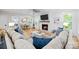Spacious living room with fireplace, hardwood floors, and open layout to the dining area at 463 Lake Wylie Rd, Belmont, NC 28012