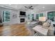 Bright living room with fireplace, shiplap wall, and ample natural light at 463 Lake Wylie Rd, Belmont, NC 28012