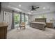 Bright main bedroom with tray ceiling, large windows, and a seating area with lots of natural light at 463 Lake Wylie Rd, Belmont, NC 28012