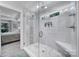 Shower featuring neutral tiling, built-in shower bench and shelving at 463 Lake Wylie Rd, Belmont, NC 28012