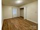 Bedroom with wood floors and window providing lots of natural light at 4805 Horizon Cir, Charlotte, NC 28215