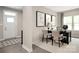 Modern home office featuring a large desk, three chairs, and three piece art set at 510 Kenyon Dr, Denver, NC 28037