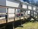 View of back deck with wooden railing, offering an outdoor space for relaxation at 5320 Golden Pond Dr, York, SC 29745