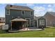 Landscaped backyard featuring a gazebo and neatly manicured lawn at 5813 Mcclintock Dr, Denver, NC 28037