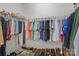 Walk-in closet with clothing racks and shelving for ample storage space at 5813 Mcclintock Dr, Denver, NC 28037