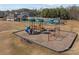 Full view of community amenities including playground, pool and clubhouse, providing a range of recreational options at 5813 Mcclintock Dr, Denver, NC 28037