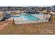 Stunning aerial view of the community pool featuring crystal-clear water and a relaxing atmosphere at 5813 Mcclintock Dr, Denver, NC 28037