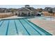 Sparkling community pool with ample deck space, lap lanes, and a separate shallow area for relaxation and recreation at 5813 Mcclintock Dr, Denver, NC 28037
