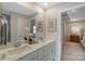 Bright bathroom with double sinks, framed mirror and decor at 6282 Tea Olive Dr # Lot 236, Harrisburg, NC 28075