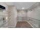 This large walk-in closet features ample shelving for maximum storage at 6282 Tea Olive Dr # Lot 236, Harrisburg, NC 28075