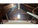 Exposed rafters and insulation in the attic provide ample storage at 702 E Grover St, Shelby, NC 28150