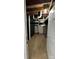 The basement reveals open ceilings with visible ductwork and utilities at 702 E Grover St, Shelby, NC 28150