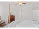 Comfortable bedroom with neutral tones, a four poster bed, and carpet flooring at 758 Latrobe Dr, Iron Station, NC 28080