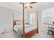 Relaxing bedroom with a four poster bed, soft carpet, and abundant natural light at 758 Latrobe Dr, Iron Station, NC 28080