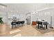Bright, open kitchen featuring white cabinets, stainless steel appliances, and a large island at 758 Latrobe Dr, Iron Station, NC 28080