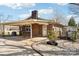 Exterior of a brick home with a carport and a small deck, blending functionality and outdoor enjoyment at 839 Oak Grove Rd, Kings Mountain, NC 28086