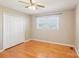 This bedroom features hardwood floors, a ceiling fan, closet and a window at 839 Oak Grove Rd, Kings Mountain, NC 28086