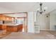 Bright dining area flows into the kitchen, featuring built-ins and neutral decor at 839 Oak Grove Rd, Kings Mountain, NC 28086