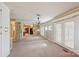 Open-concept dining room features a mirrored wall and French doors for natural light at 839 Oak Grove Rd, Kings Mountain, NC 28086