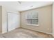 Carpeted bedroom featuring neutral walls, a closet, and a window for natural light at 9391 Leyton Dr, Harrisburg, NC 28075