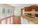Bright kitchen with granite countertops, double sink, and adjacent dining area at 9391 Leyton Dr, Harrisburg, NC 28075