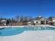 Community pool with clear blue water and a covered lounging area for residents' enjoyment at 112 Parker Claire Ln, Kings Mountain, NC 28086