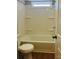 Bathroom with a tub-shower combo and white walls, perfect for relaxation at 1151 Bowling Green Dr, Clover, SC 29710