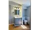 Bathroom featuring a vanity, mirror, and toilet with beadboard at 1151 Bowling Green Dr, Clover, SC 29710