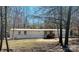 Exterior view of a single story home featuring a small porch and yard with trees at 1151 Bowling Green Dr, Clover, SC 29710