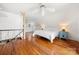 Cozy bedroom with wood floors and a ceiling fan at 116 Cottage Grove Ln, Mooresville, NC 28117