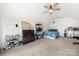 Bedroom with bed, carpet, ceiling fan, and black dresser at 116 Cottage Grove Ln, Mooresville, NC 28117