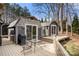 Outdoor deck with seating area, grill, and sliding doors that create an ideal space for relaxation at 116 Cottage Grove Ln, Mooresville, NC 28117