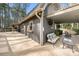 Outdoor entertainment space with seating and grill on the deck of a spacious home for sale at 116 Cottage Grove Ln, Mooresville, NC 28117