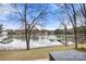 Scenic waterfront view with boats on the lake from this home for sale in a desirable neighborhood at 116 Cottage Grove Ln, Mooresville, NC 28117
