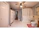 Neutral toned bathroom with floral shower curtain and accessible grab bar at 129 38Th St, Hickory, NC 28601