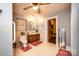 Cozy bathroom features a wood vanity, neutral tile floor, and decorative accents at 129 38Th St, Hickory, NC 28601