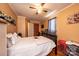 Neutral-toned bedroom with hardwood flooring and ample natural light at 129 38Th St, Hickory, NC 28601