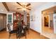 Cozy dining room with elegant decor, wooden floors, and a stylish glass table at 129 38Th St, Hickory, NC 28601