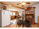 Kitchen with wooden cabinets and appliances, open to a charming dining area at 129 38Th St, Hickory, NC 28601