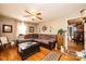 Cozy living room featuring a comfortable sectional sofa, wooden floors, and natural light at 129 38Th St, Hickory, NC 28601