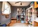 Well-organized pantry with shelving, storage containers, and natural light from a window at 129 38Th St, Hickory, NC 28601