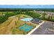 Aerial view showcasing community pool, tennis courts, and surrounding landscape at 1440 Ardmore Dr # 343, Sherrills Ford, NC 28673
