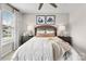 Comfortable bedroom with two windows providing natural light, decorative headboard, and modern lighting at 1440 Ardmore Dr # 343, Sherrills Ford, NC 28673