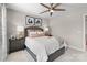 Inviting bedroom with neutral walls, decorative headboard, bedside tables, and modern ceiling fan at 1440 Ardmore Dr # 343, Sherrills Ford, NC 28673