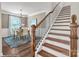 Dining room with a wooden table, seating for six, a view of the staircase, and modern decor at 1440 Ardmore Dr # 343, Sherrills Ford, NC 28673